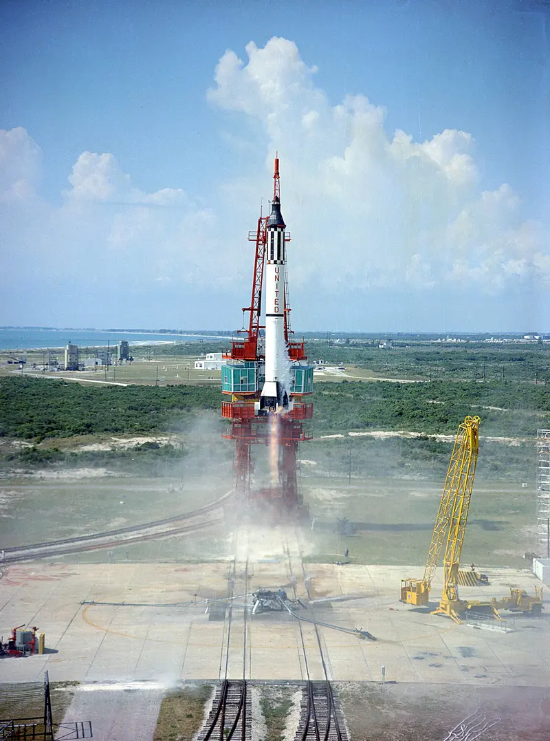 Freedom 7. Alan Shepard lifts off to become the first American in space, a 15-minute flight that started the race to the Moon.