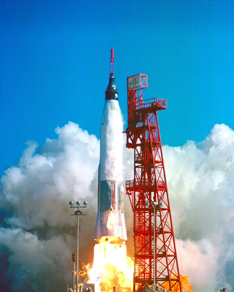 Friendship 7. John Glenn rides an Atlas rocket off the pad to become the first American to orbit the Earth.