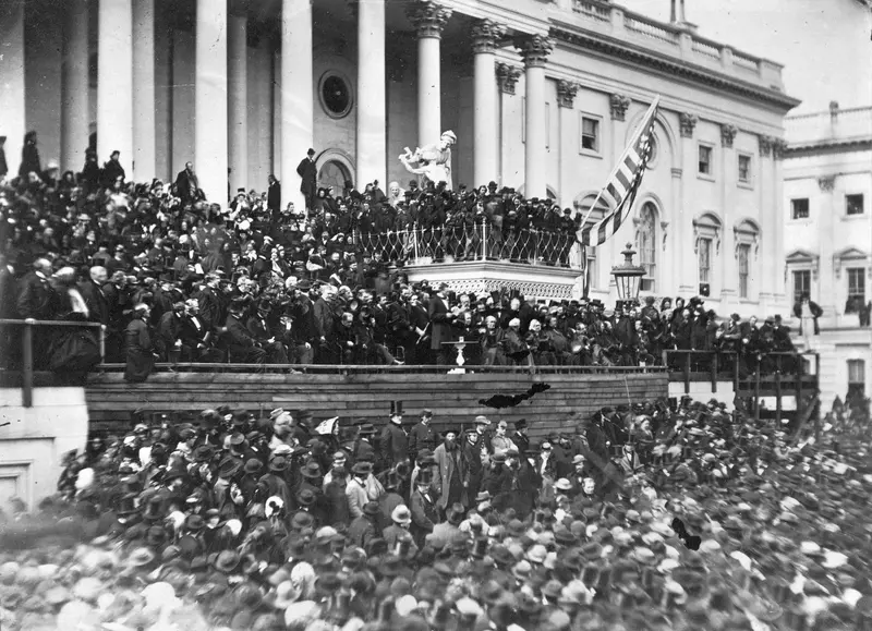 With Malice Toward None. Alexander Gardner photographs Lincoln delivering his Second Inaugural Address at the newly finished Capitol.
