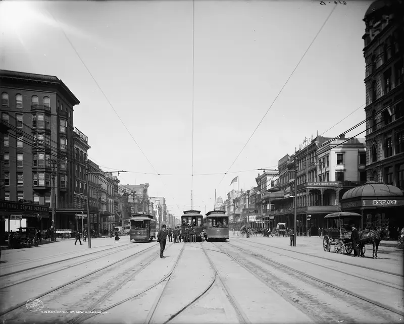 New Orleans, 1907: Canal Street. Streetcars, awnings and crowds on Canal Street, one of the widest main streets in America.