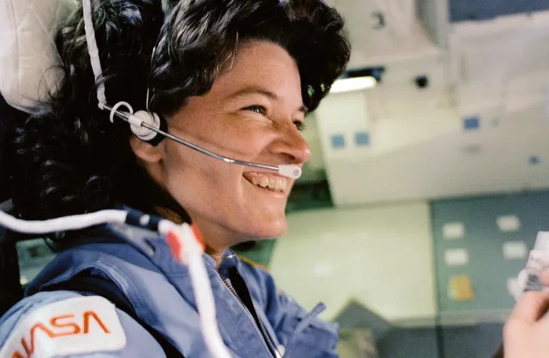 Sally Ride, STS-7. Sally Ride, the first American woman in space, at work on the Challenger flight deck.