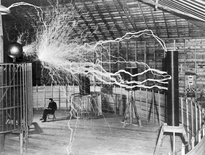 Tesla's Lightning. Nikola Tesla sits calmly in his Colorado Springs lab as his magnifying transmitter throws bolts of man-made lightning.