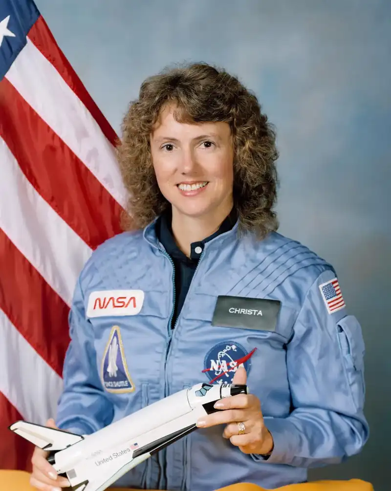 Christa McAuliffe, astronaut. Christa McAuliffe, a teacher from New Hampshire, was a payload specialist on Challenger, STS-51-L.