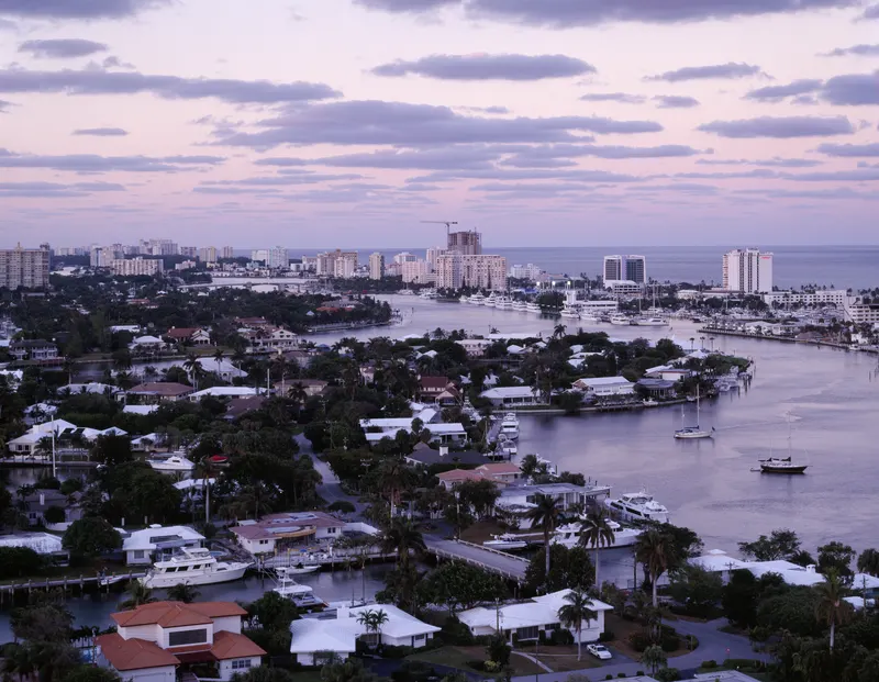 Fort Lauderdale at dusk. Called the 'Venice of America', Fort Lauderdale has about 165 miles of navigable inland waterways, cut largely by dredging swampland in the 1920s land boom.