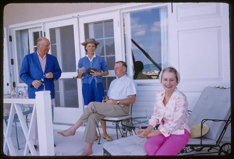 Cocktails at Lyford Cay, 1960 (Toni Frissell). Members and guests lounge on the terrace in Frissell's 1960 visit.