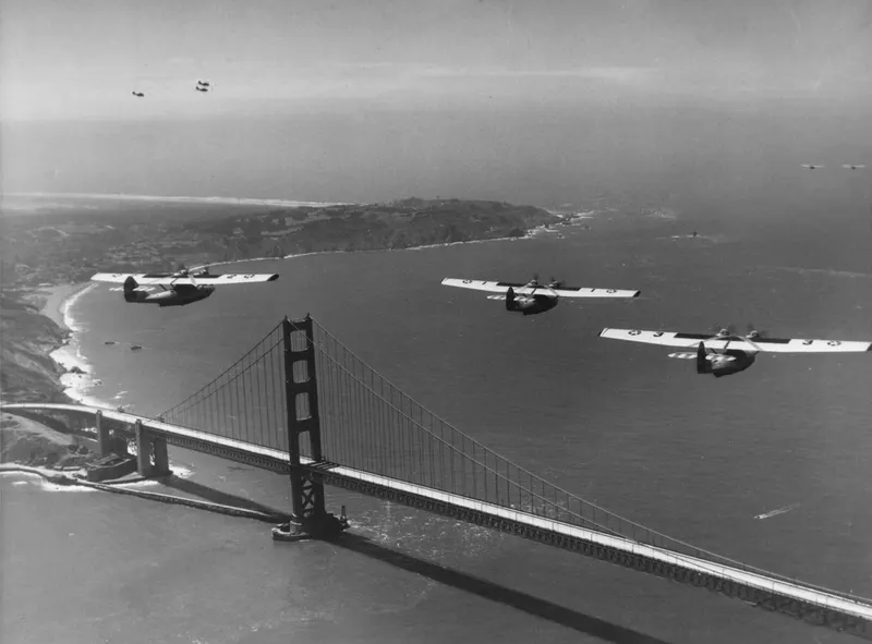 Navy Catalinas over the Golden Gate, 1937. Navy flying boats flew over the bridge in May 1937, the month it opened as the longest suspension span in the world.