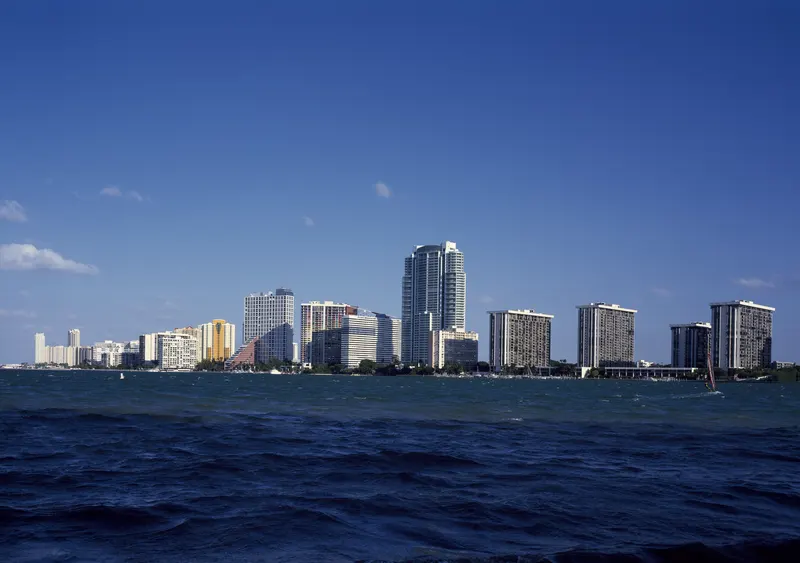 Miami skyline from Biscayne Bay. Miami is the only major US city founded by a woman: Julia Tuttle talked Henry Flagler into extending his railroad there after the 1894-95 freeze, and the city incorporated in 1896.